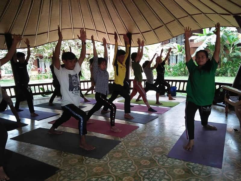 People do yoga in cambodia